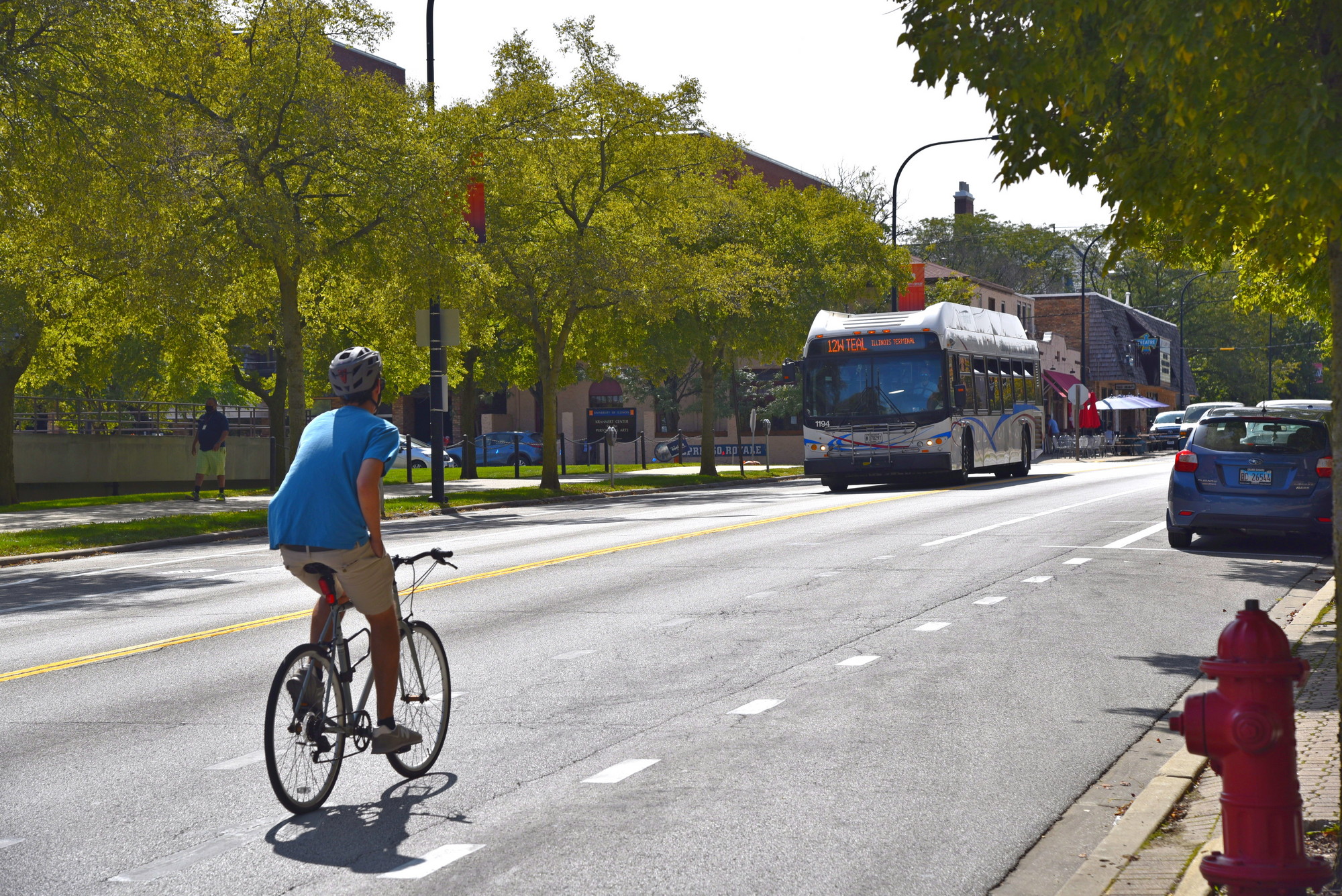 Biker and MTD bus on Goodwin Ave.