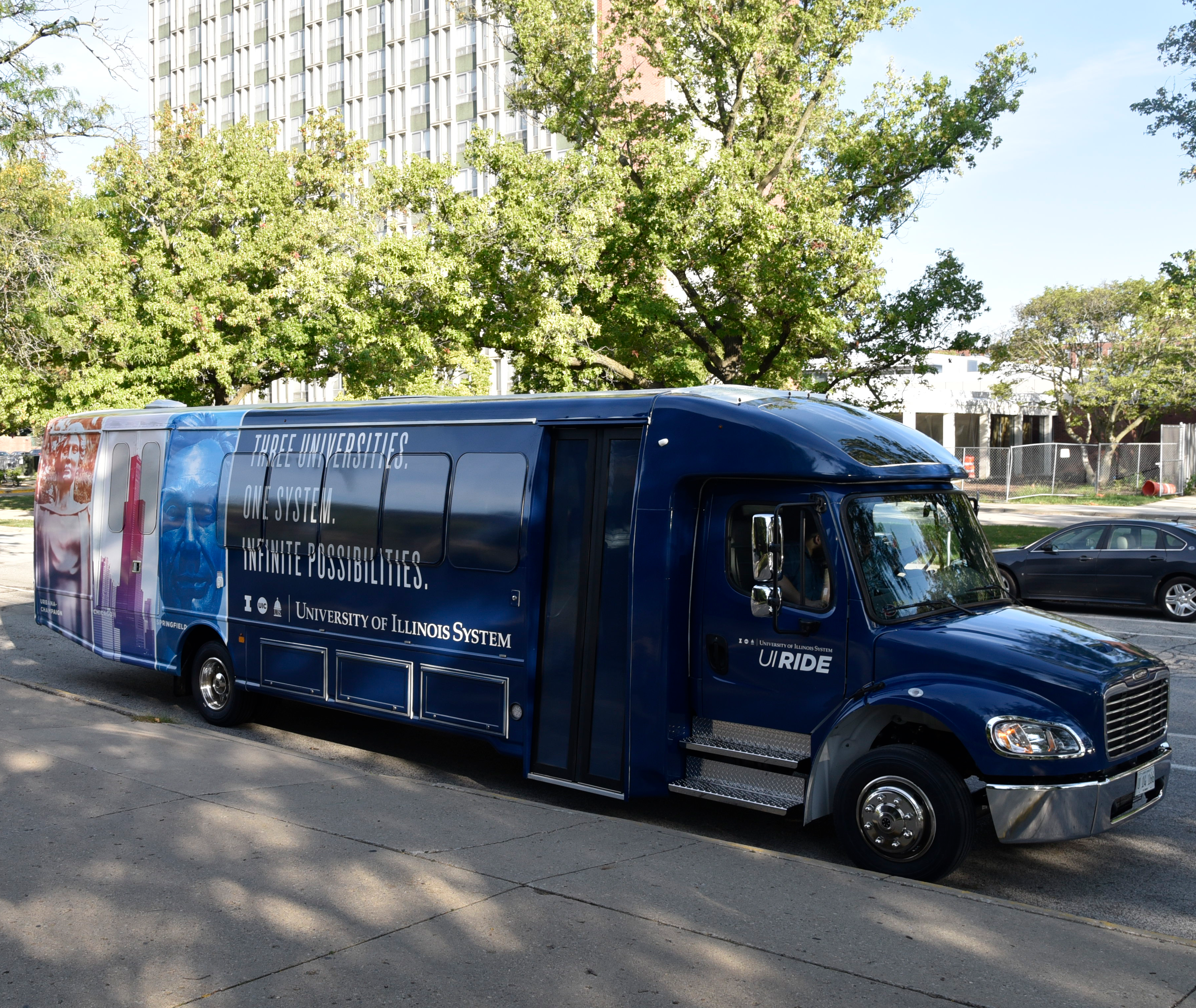 UI Ride Shuttle parked in front of the Levis Center